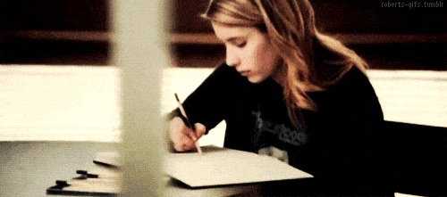 young girl taking notes by hand gif