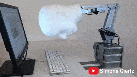 gif of robot rolling face on computer keyboard