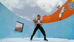 gif of Jim Carrey looking closely into camera